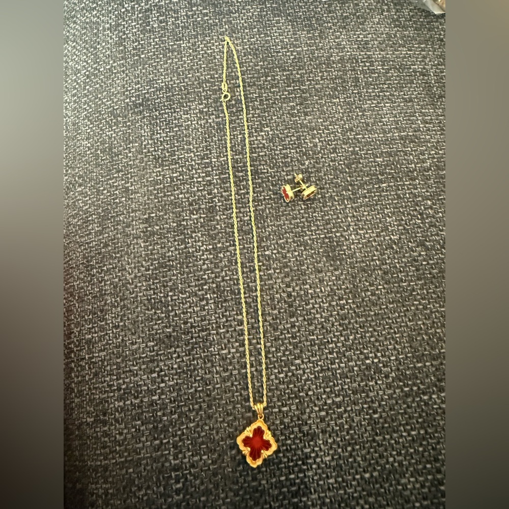 Elegant Gold Necklace with Red Pendant